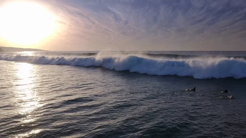 Flying over the Waves of the Ocean to the Sun and the sea Aerial view 4K Stock Footage 126479277