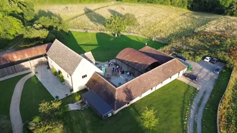 Flying Over A Wedding Party Hosted In A Barn In The Cotswolds Video stock 246326727