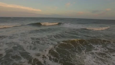 Flying over white foam beach waves Video stock 167372023