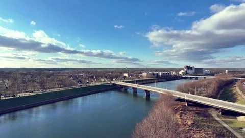 Flying over White River towards the west side of Indianapolis Video stock 296658554