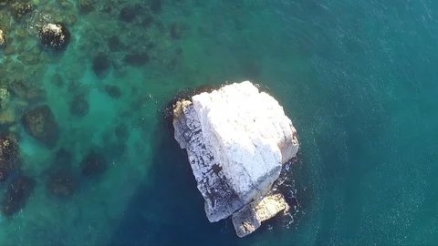 Flying over a white rock Stock Footage 105974047