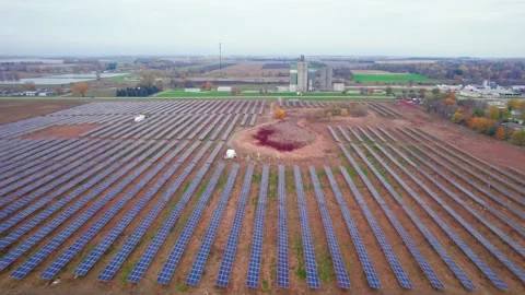 Flying Over Wide Setup Of Solar Panels In Lines , Atwater, MN, USA Stock Footage 256119397