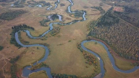 Flying over a winding river. Drone view Stock Footage 105275221