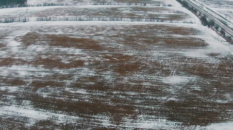 Flying Over Winter Agricultural Fields in Cloudy Weather Video stock 47456341
