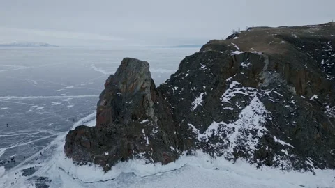 Flying over the winter Cape Khoboy in the ice Stock Footage 278302176