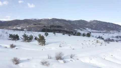 Flying over a winter landscape Stock Footage 137878154