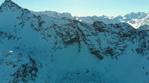 Flying over the winter Mountains in Alps Stock Footage 102287992