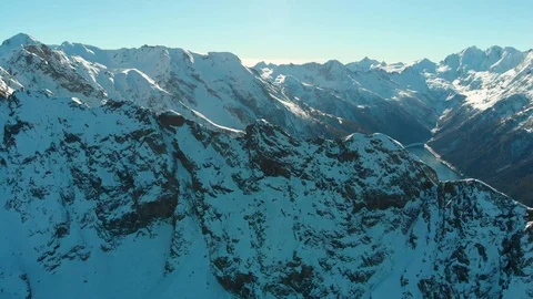Flying over the winter Mountains in Alps Stock Footage 102288292