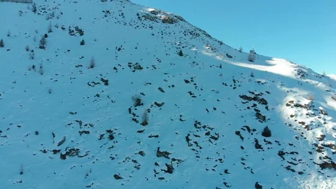 Flying over the winter Mountains in Alps Stock Footage 102288796