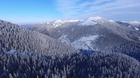 Flying over a winter mountains Stock-Footage 88688166