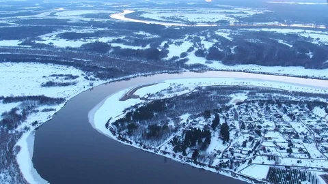 Flying over the winter river Video stock 106473454
