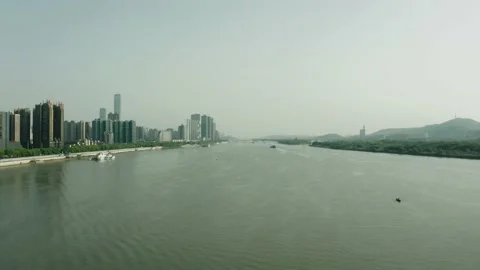 Flying over Xiang River towards Changsha Skyline Stock Footage 167398261