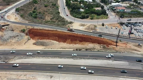 Flying over Yanai interchange under construction Israel highway2 AUG12 2022 Stock Footage 293227692