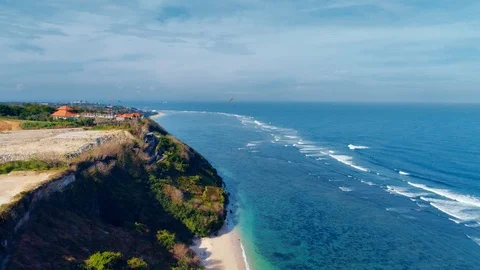 Flying overlooking the ocean waves and rocky shore Stock Footage 109478014