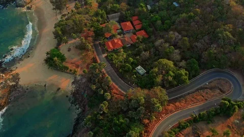 Flying overlooking Yanui Beach and surrounding area on Phuket Island in Thailand Stock Footage 125190254