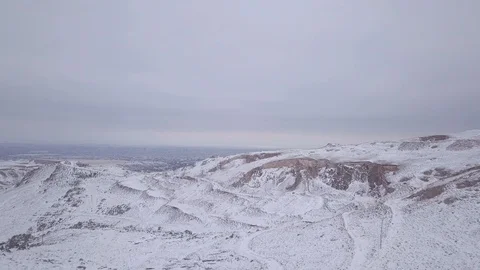 Flying pan left snowy mounty area Stock Footage 102631829