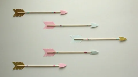 Flying paper arrows in multiple directions stop motion animation Stock Footage 101299266
