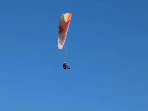 Flying Paraglider on a Background of the Sun and Beautiful Clouds.summer Day Stock Footage 81114643