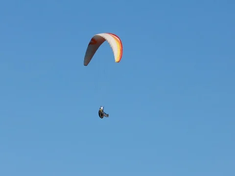Flying Paraglider on a Background of the Sun and Beautiful Clouds.summer Day 動画素材 81114656