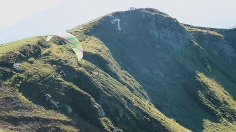 Flying Paraglider on a Background of the Sun and Beautiful Clouds Stock Footage 81545546