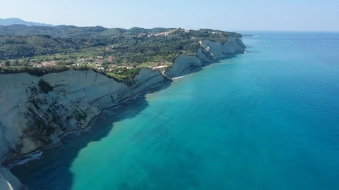 Flying  Parallel past white cliffs turquoise sea Stock-Footage 114186428