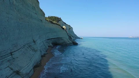 Flying  Parallel past white cliffs turquoise sea Stock-Footage 114186488