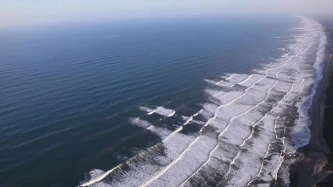 Flying Paramotor over the Coastline Stock Footage 332520779