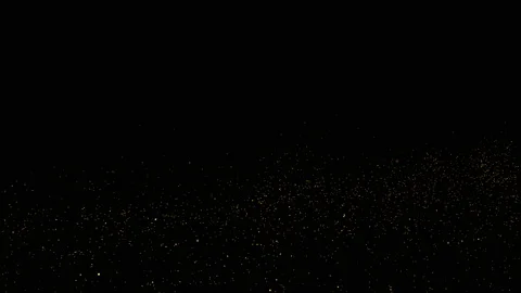 Flying Particles over black background. Flying Embers from fire. Video stock 203298538