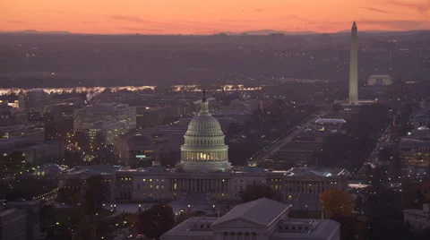 Flying past the Capitol at dusk with Supreme Court Building and Library of Stock Footage 59191015
