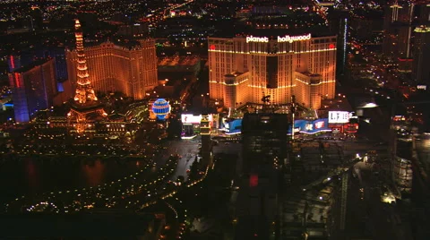 Flying past casinos under construction on the Las Vegas Strip at night. Shot in Stock Footage 59544846