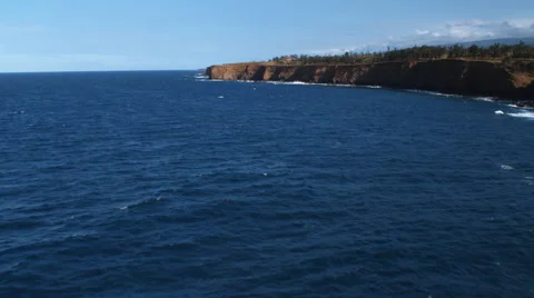 Flying past cliffs along Hawaii's North Shore Stock Footage 59521951