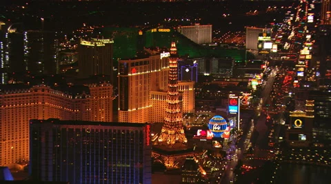 Flying past the Eiffel Tower replica near Paris Las Vegas at night. Shot in Stock Footage 59545065