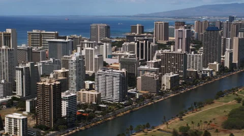 Flying past high-rises along Honolulu's Waikiki Beach. Shot in 2010. Stock Footage 59354099
