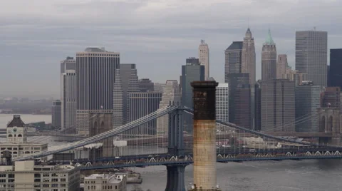 Flying past industrial smokestacks on the Brooklyn side of the East River, Stock Footage 59165134