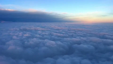 Flying past Layer Of Clouds at dawn, Video stock 205033527