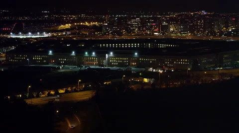Flying past the Pentagon at night, Washington DC in background. Shot in 2011. Stock Footage 59195093