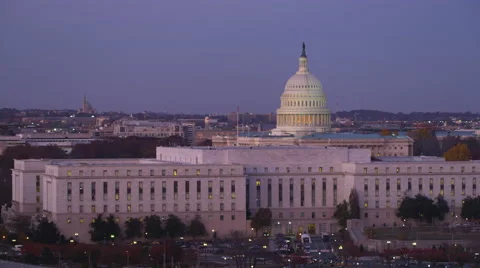 Flying past Senate Office Buildings in front of the Capitol at dusk, Washington Stock Footage 59189967