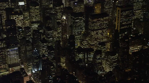 Flying past the skyscrapers of Midtown Manhattan at night, heading toward Times Stock Footage 59171242