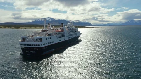 Flying Past a Small Cruise Ship in Puerto Natales Stock Footage 100641368