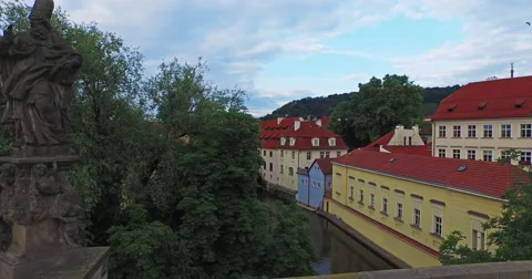 Flying past the statue on the Charles Bridge, the Czech Republic Stock Footage 61041998