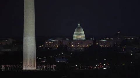 Flying past the Washington Monument at night, US Capitol Building in background. Vídeos de archivo 59193181
