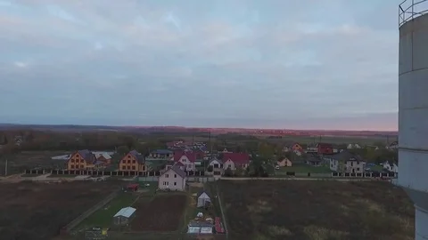 Flying Past the Water Tower  Copter Shooting Stock Footage 69859014