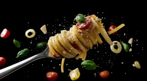 Flying  Pasta in Slow Motion - Bullet Time Food Explosion with Tomato, Basi 動画素材 306299267