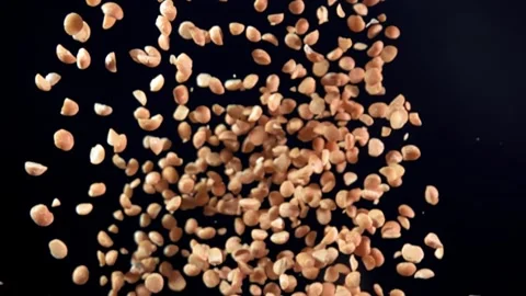 Flying peanuts on a black background. Super slow motion Stock Footage 280686047