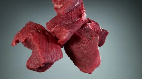 Flying piece of raw beef steaks hitting up in the air Stock Footage 139816296