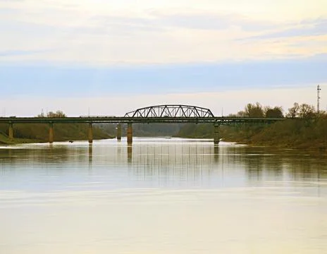 Flying plane in a cloudless sky Stock Photos