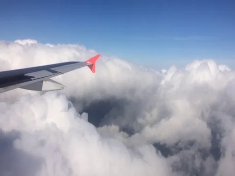 Flying plane in clouds Stock Footage 84653902