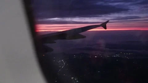 Flying Plane by passenger view from window seat, evening Stock Footage 136901555