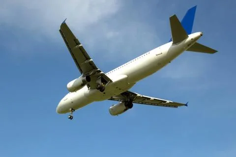 Flying plane Stock Photos