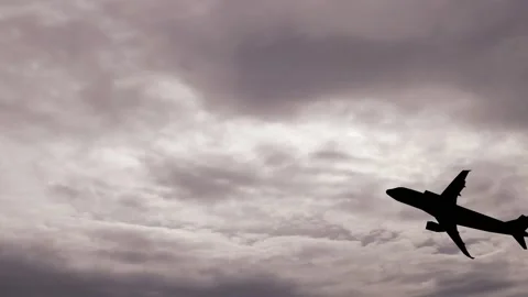 Flying plane silhouette animation Stock Footage 132986462